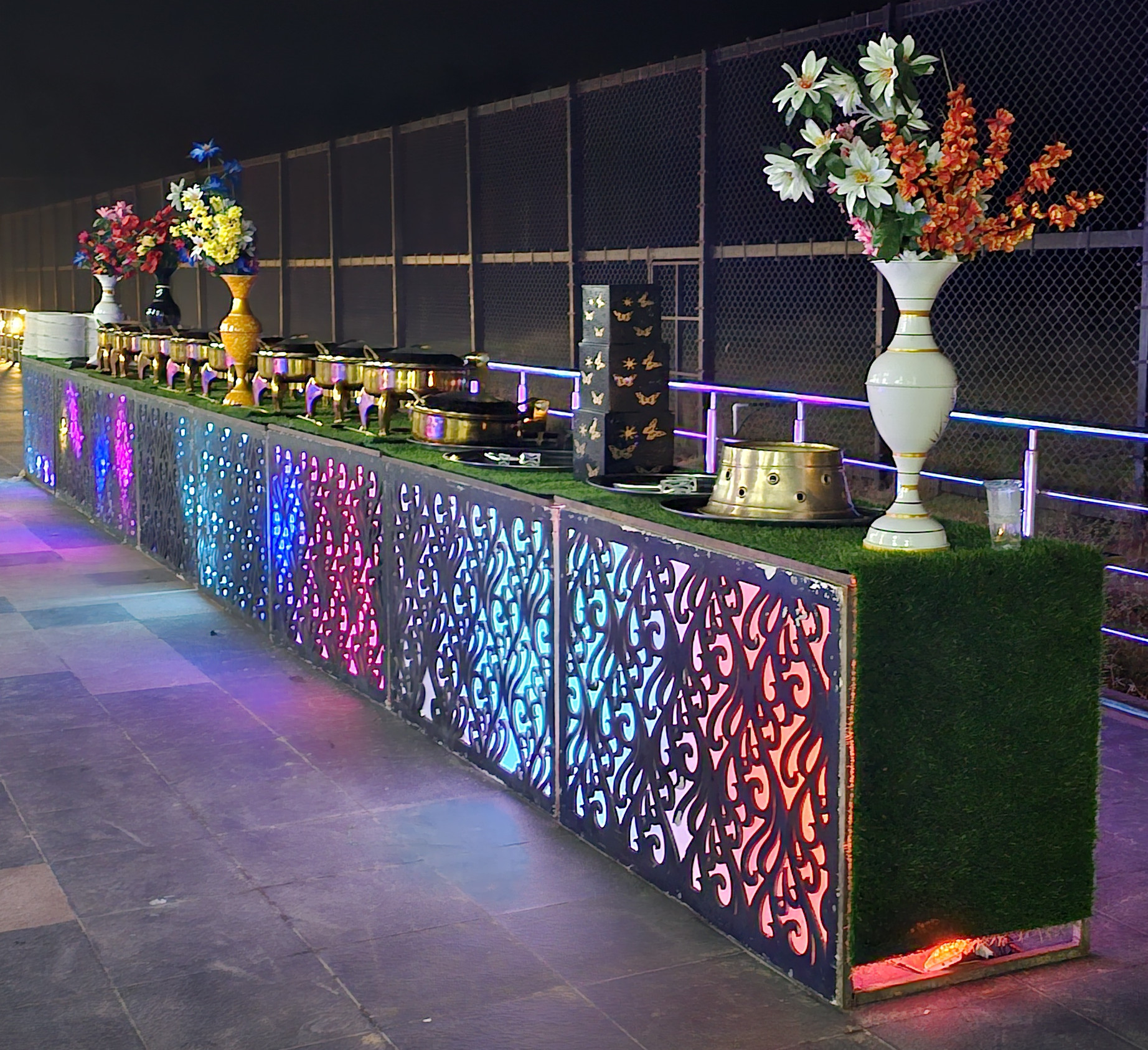 Illuminated buffet counter with florals